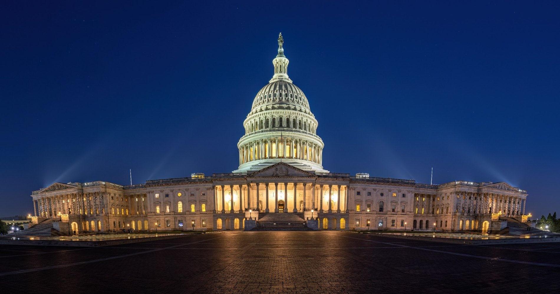 The United States Capitol illuminated at night
